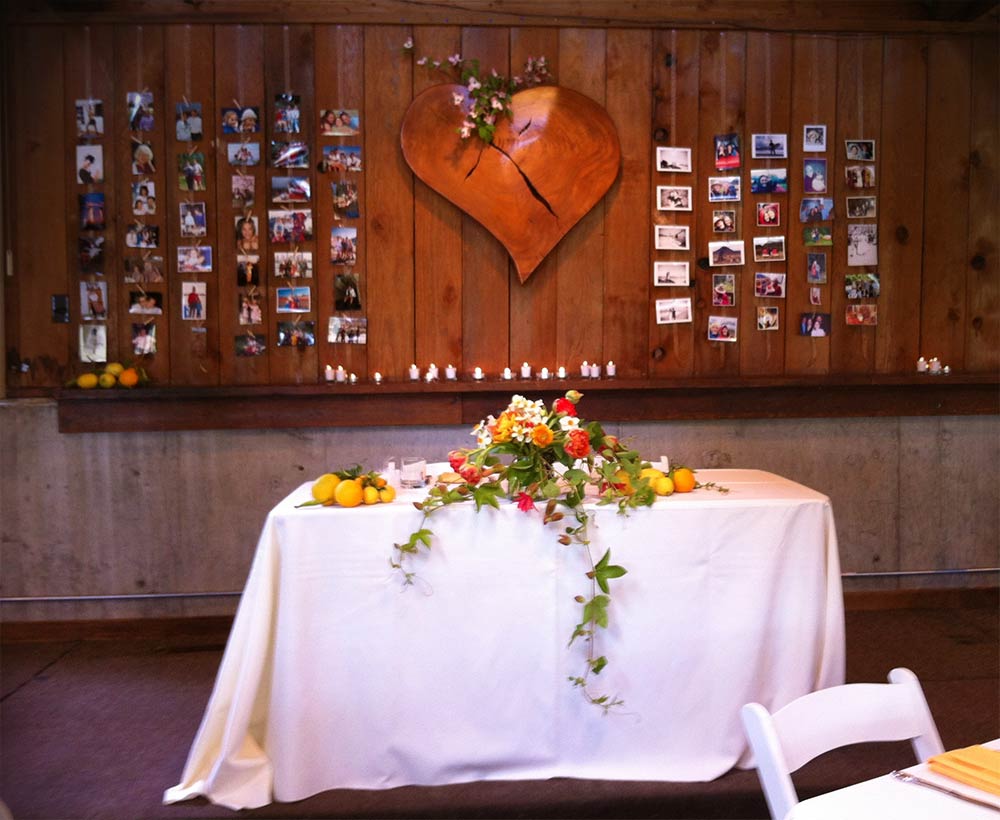 The Bride and Groom’s Table under the Muir Beach Wooden Heart – Photo by Kathy Sward